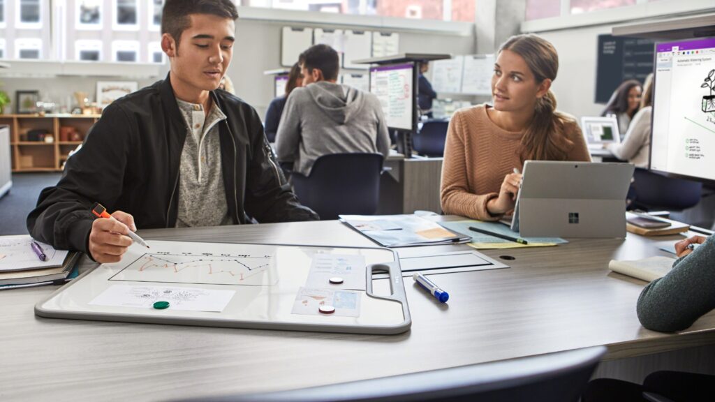 Students using the Steelcase Verb Active Media Table in schools