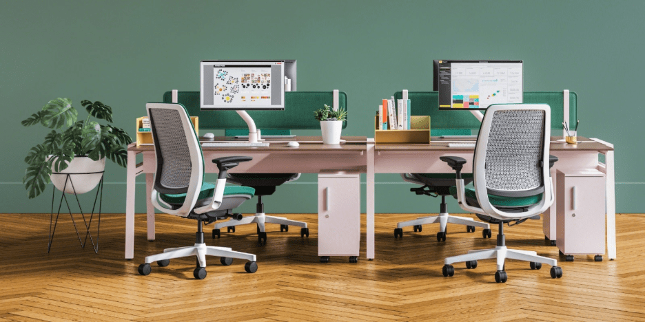 Green colored Steelcase Amia chair in a biophilic office setup.